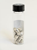 Tin Metal Pellets 20 Grams, 99.9% Pure in our new "Stand Tall" Glass Vial. - The Periodic Element Guys