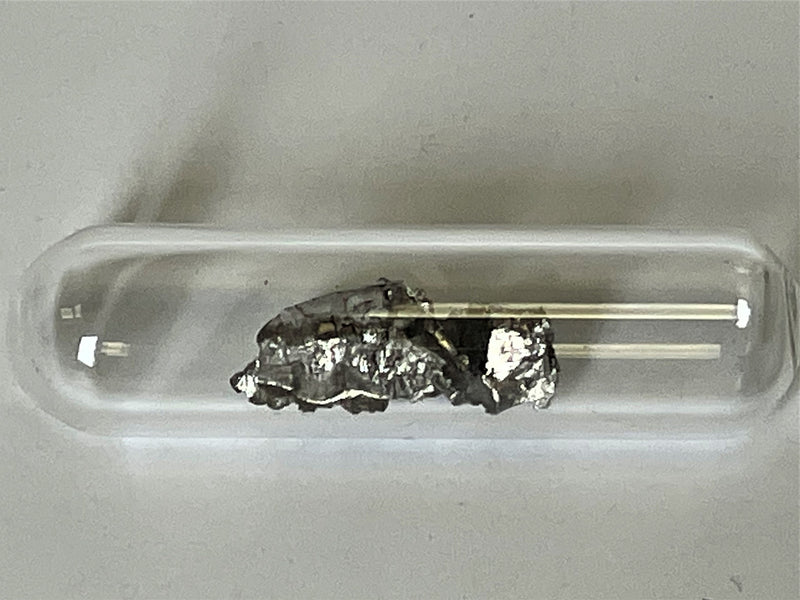 Praseodymium Metal 99.9% 1 Gram +  Shiny under Argon in glass ampoule in Labeled Glass Vial - The Periodic Element Guys