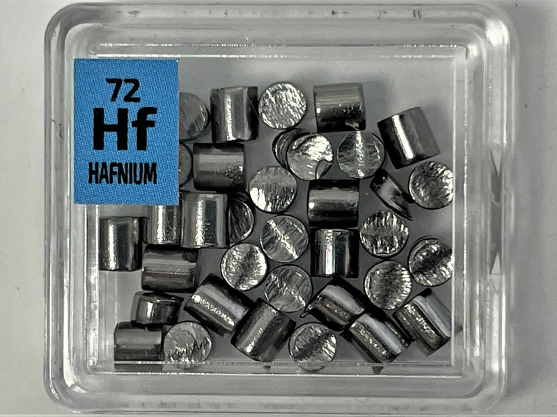 Hafnium Metal Pellets 10 Grams 99.9% Pure in our new thicker tiles - The Periodic Element Guys