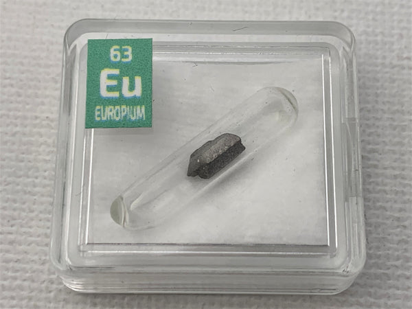 Europium Metal in Glass ampoule under argon, Clean and Shiny  99.9% in a Periodic Element Tile - The Periodic Element Guys