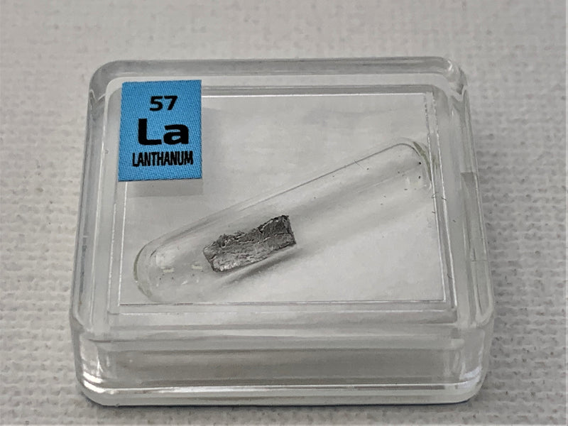 Lanthanum Metal in Glass ampoule under argon, Clean and Shiny  99.9% in a Periodic Element Tile - The Periodic Element Guys